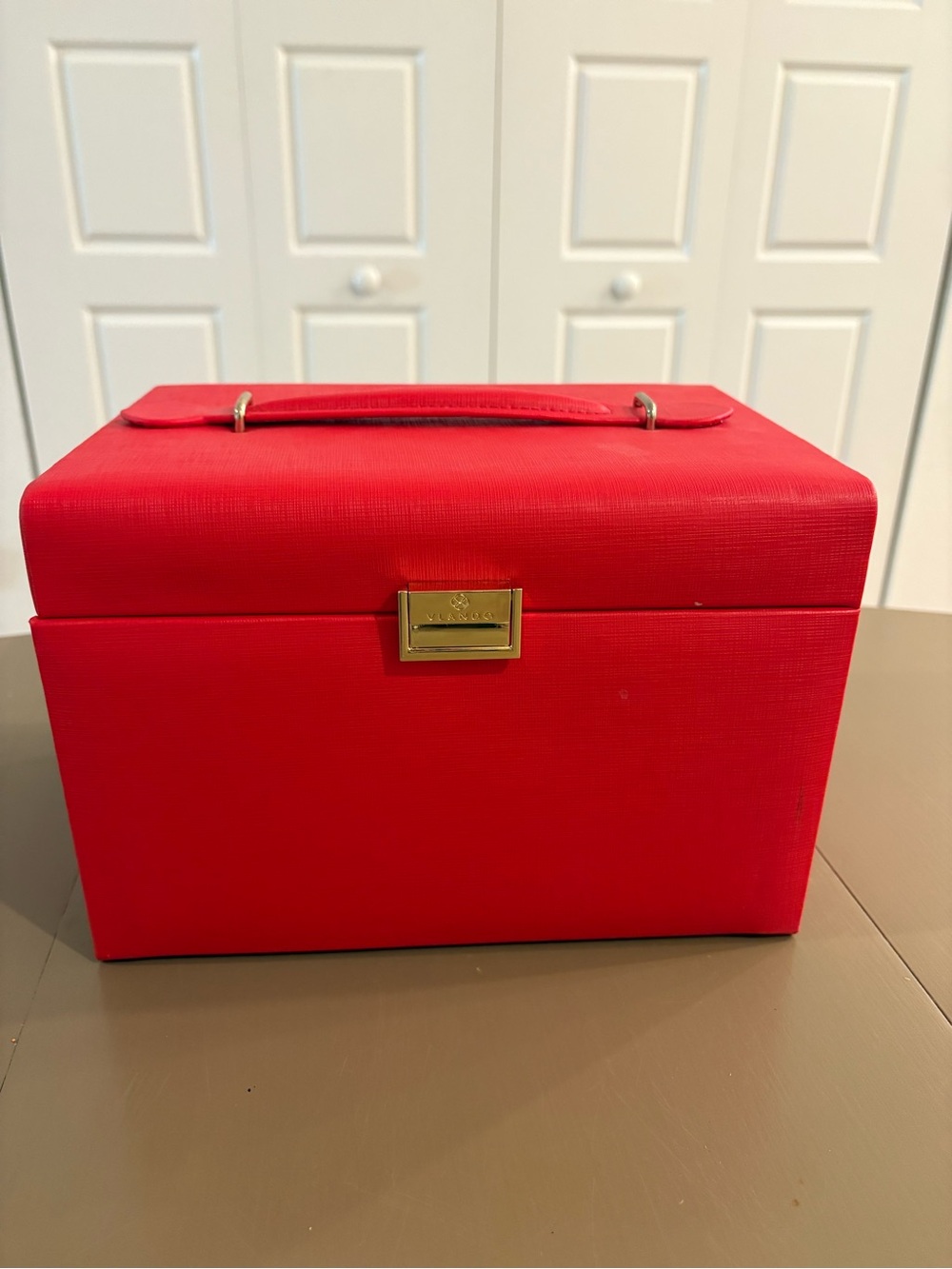Red Jewelry Storage Case with Gold Accent Handle